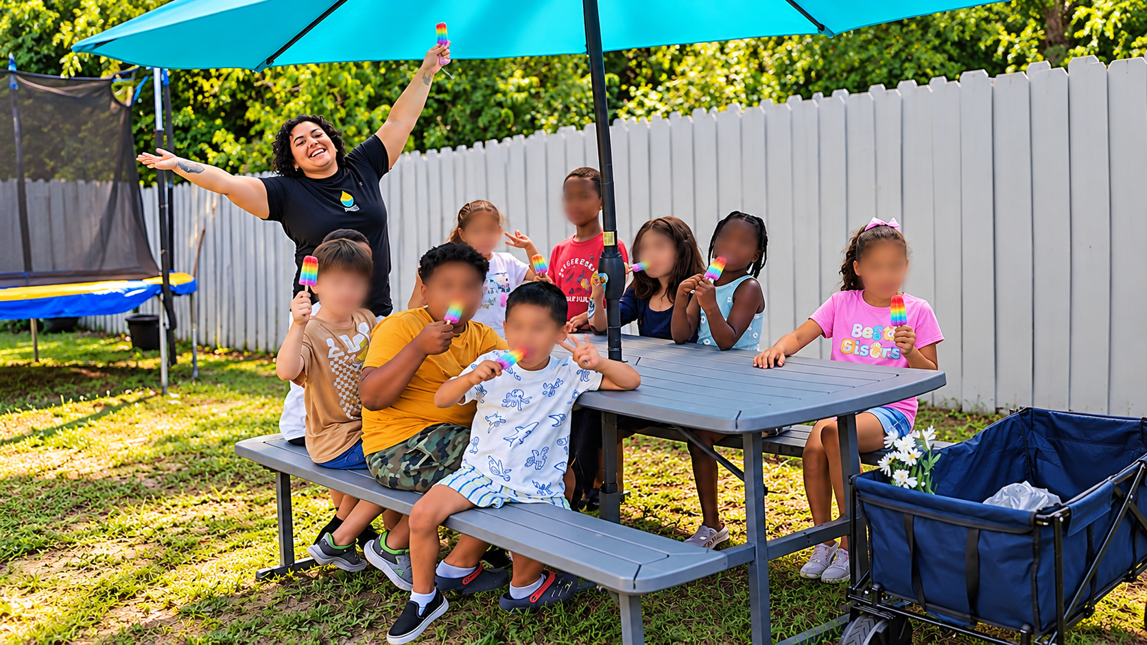 Children celebrating with rainbow popsicles at a World Water Alliance backyard workshop
